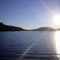 Sun over Christine Lake in Shark, New Hampshire