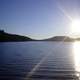 Sun over Christine Lake in Shark, New Hampshire