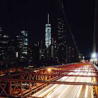 Bridge and skyscrapers at Night in New York City