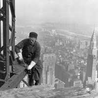 A construction worker on top of the Empire State Building as it was being built in 1930 in New York