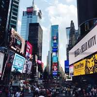 People, buildings, and busy life in Times Square in New York City