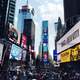 People, buildings, and busy life in Times Square in New York City