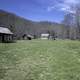 Log Cabin on grass lawn at Great Smoky Mountains National Park, North Carolina