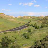 Road across the landscape at Theodore Roosevelt National Park, North Dakota