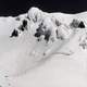 Snow capped peak with climbers on Mount Hood