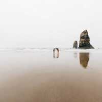 Two people on the beach in Oregon