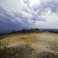 Hilltop landscape under the sky and clouds at Sassafras Mountain, South Carolina