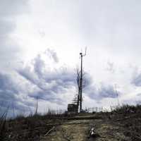 Weather Tower under the clouds at the top at Sassafras Mountain, South Carolina