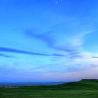 Dusk over the grassland at Badlands National Park, South Dakota