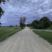 Dirt Path with clouds in the sky in Wasta