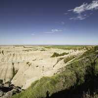 Family standing by the hills of the Badlands