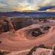 Dramatic Landscape and Sunset over clouds in Arches National Park