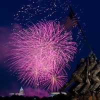 Fireworks are seen from the U.S. Marine Corps Memorial area, in Arlington, Va.  