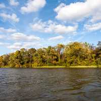 Shoreline landscape with clouds and trees in Virginia