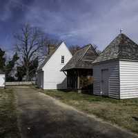 Small buildings supporting a house in Yorktown, Virginia