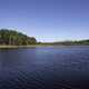 Opposite shore view across the small lake