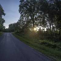 Late Afternoon sun setting beyond the trees at Cross Plains State Park