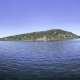 Scenic Panoramic of devils lake with people canoeing 