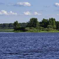 Island with trees in the middle of the lake