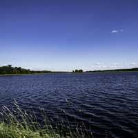 Lake with water under blue sky
