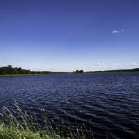 Lake with water under blue sky