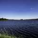 Lake with water under blue sky