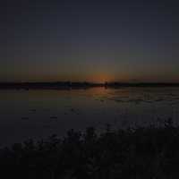 Sunset at dusk over Rice Lakes at George Meade Wildlife Refuge