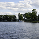 Boat on Green lake with clouds