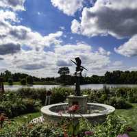 Clouds over the central statue in the garden