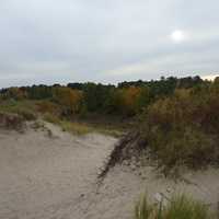 Sun setting Behind a Dune at Kohler-Andrae State Park, Wisconsin