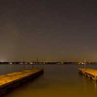 Docks in darkness under the light at Lake Kegonsa State Park, Wisconsin