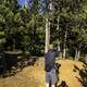 Man taking picture of trees at Levis Mound, Wisconsin