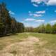 Picnic Site landscape under blue skies at Levis Mound