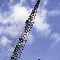 Construction Crane Above Ruins of building