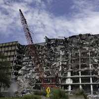 Large Crane and demolished DMV building