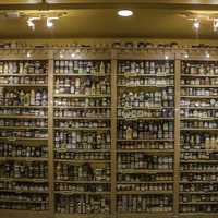 Mustard from different states display case at National Mustard Museum