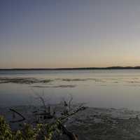 Sunset photo of the lake on the bridge