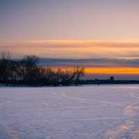 Dusk over the frozen lake landscape on Lake Mendota, Madison, Wisconsin