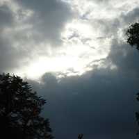 Sun appearing over thick clouds in Madison, Wisconsin