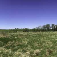 Panorama of grassland and trees on the Military Ridge State Trail, Wisconsin