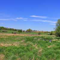 Landscape of sky and grassland on the Military Ridge State Trail