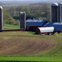 Farm silos and barn on the Military Ridge State Trail