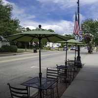 Outside dining place on the sidewalk with sky in Mount Horeb
