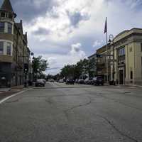 Street with buildings on the side with clouds in Mount Horeb, Wisconsin