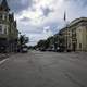 Street with buildings on the side with clouds in Mount Horeb, Wisconsin