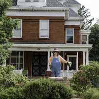 Troll statue in front of a house in Mount Horeb