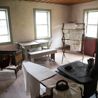 Ironing board, furnace, cradle, and table