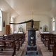 Rows of pews in the Church