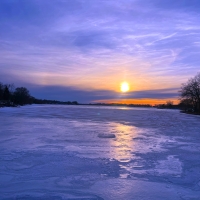 Sunset over frozen Beaver Dam Lake