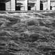 Black and White Close up of rushing water of the river